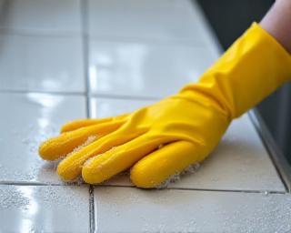 Scrubbing kitchen tiles and deep cleaning appliances